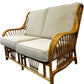 Rattan Two-Seater Conservatory Sofa with Beige Cushions Wicker Frame (Pre-Loved)