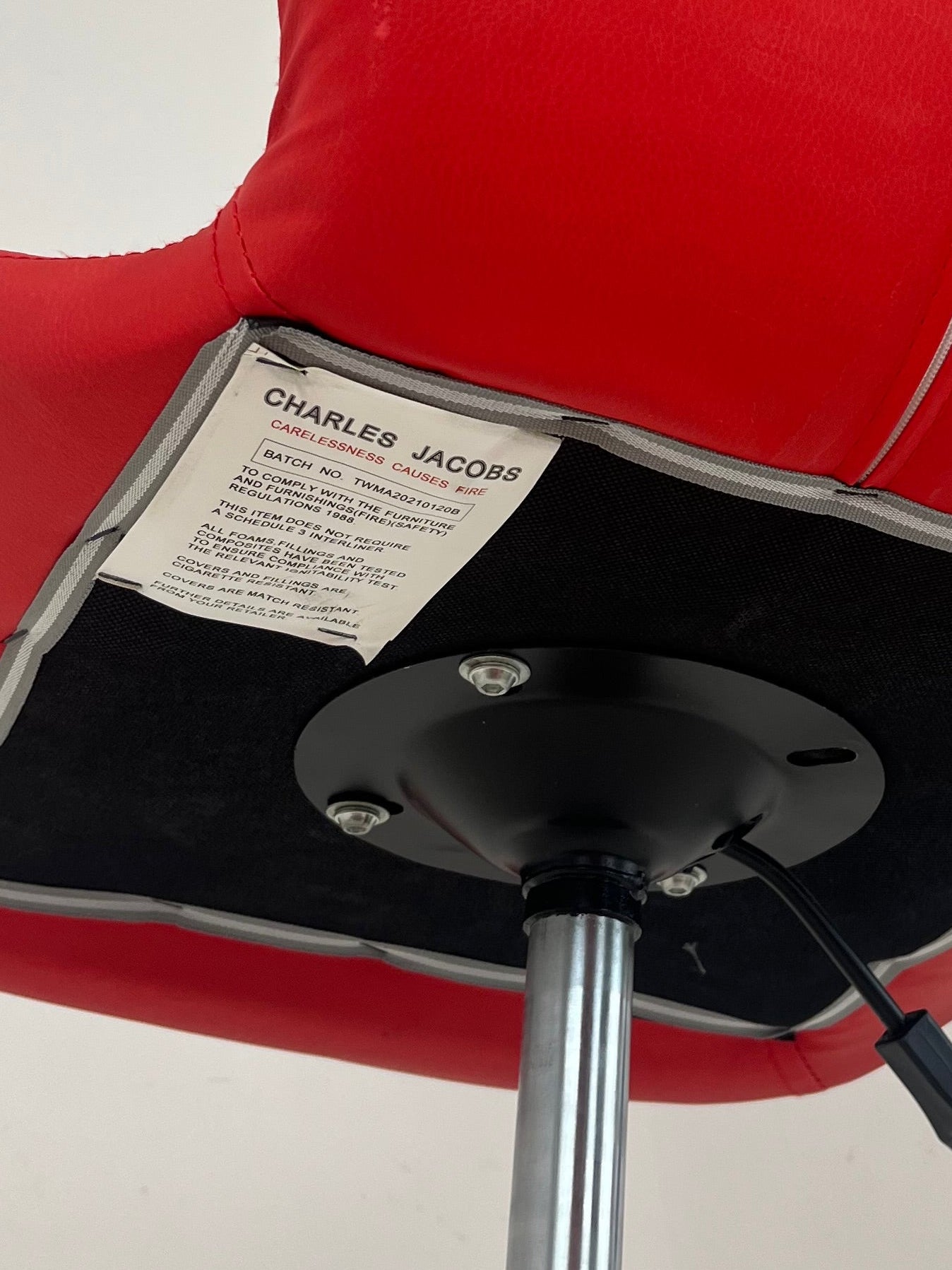 Charles Jacobs Red Cushioned Swivel Chair (Pre-Loved)