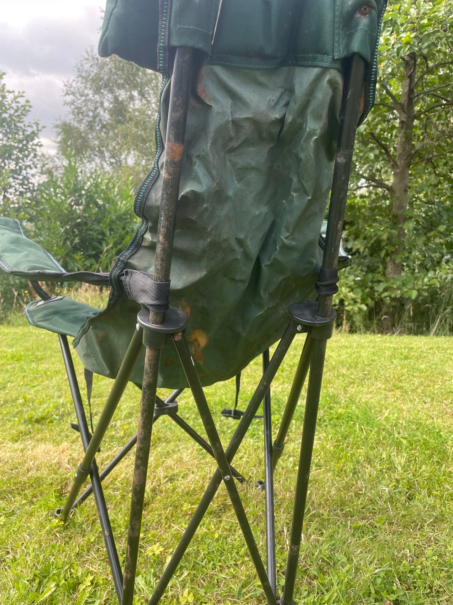 Camping folding green chair with attachable footrest and bag (Pre-loved)