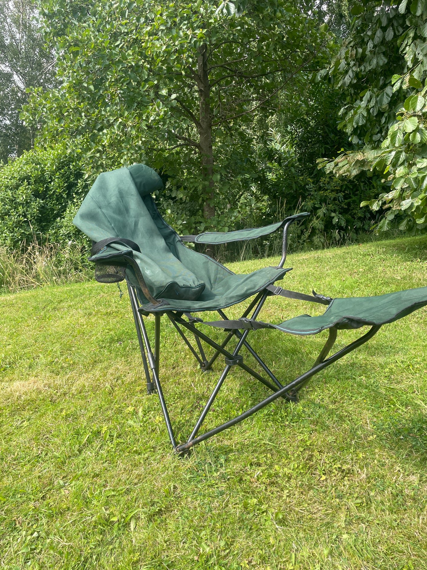 Camping folding green chair with attachable footrest and bag (Pre-loved)