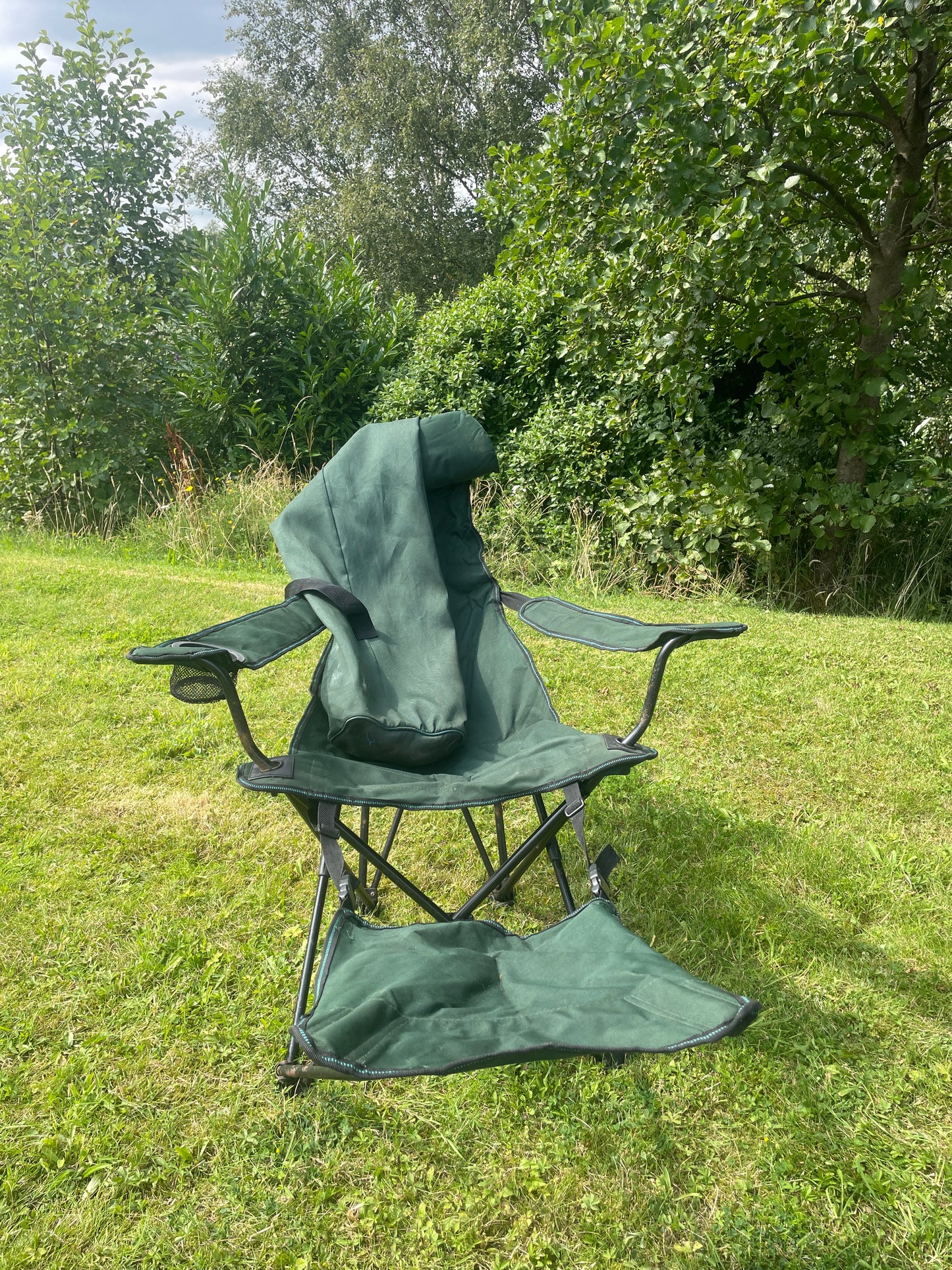 Camping folding green chair with attachable footrest and bag (Pre-loved)